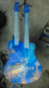 Profile Image of Clouds Guitar in the works for Emerald Guitars Designed by Phil Atkinson Airbrush Artist Profile Image of Clouds Guitar in the works for Emerald Guitars Designed by Phil Atkinson Airbrush Artist
