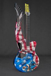 Rosie the Riveter Guitar for Musician Mr John Veld supplied by Emerald Guitars and designed Phil Atkinson Airbrush Artist Rosie the Riveter Guitar by Phil Atkinson Airbrush Artist